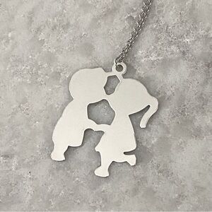 Boy and Girl Kissing Silver Necklace